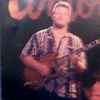 Jonathan Cleveland performing Austin Live Music with guitar